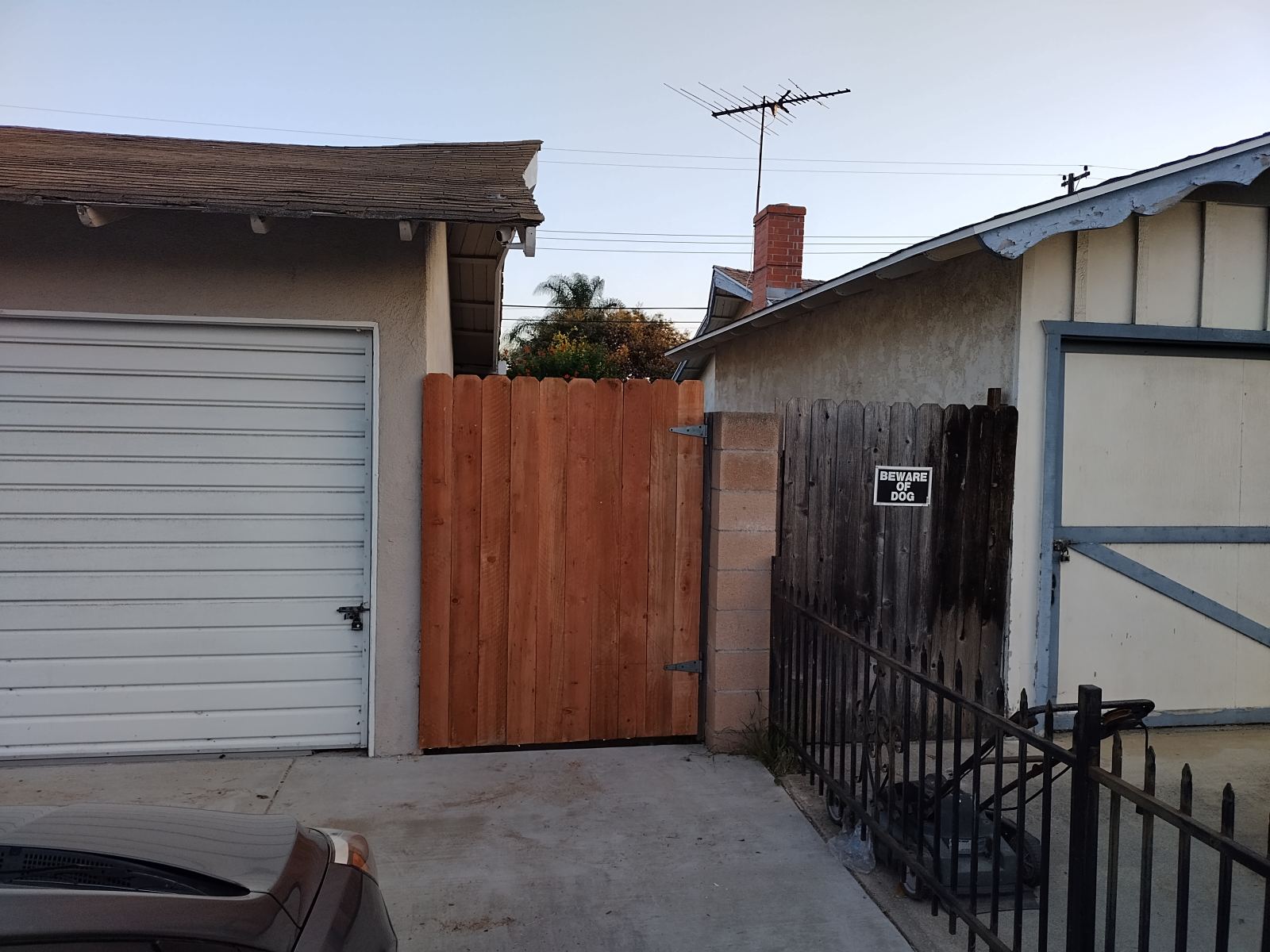 New redwood gate, built to match the old lines