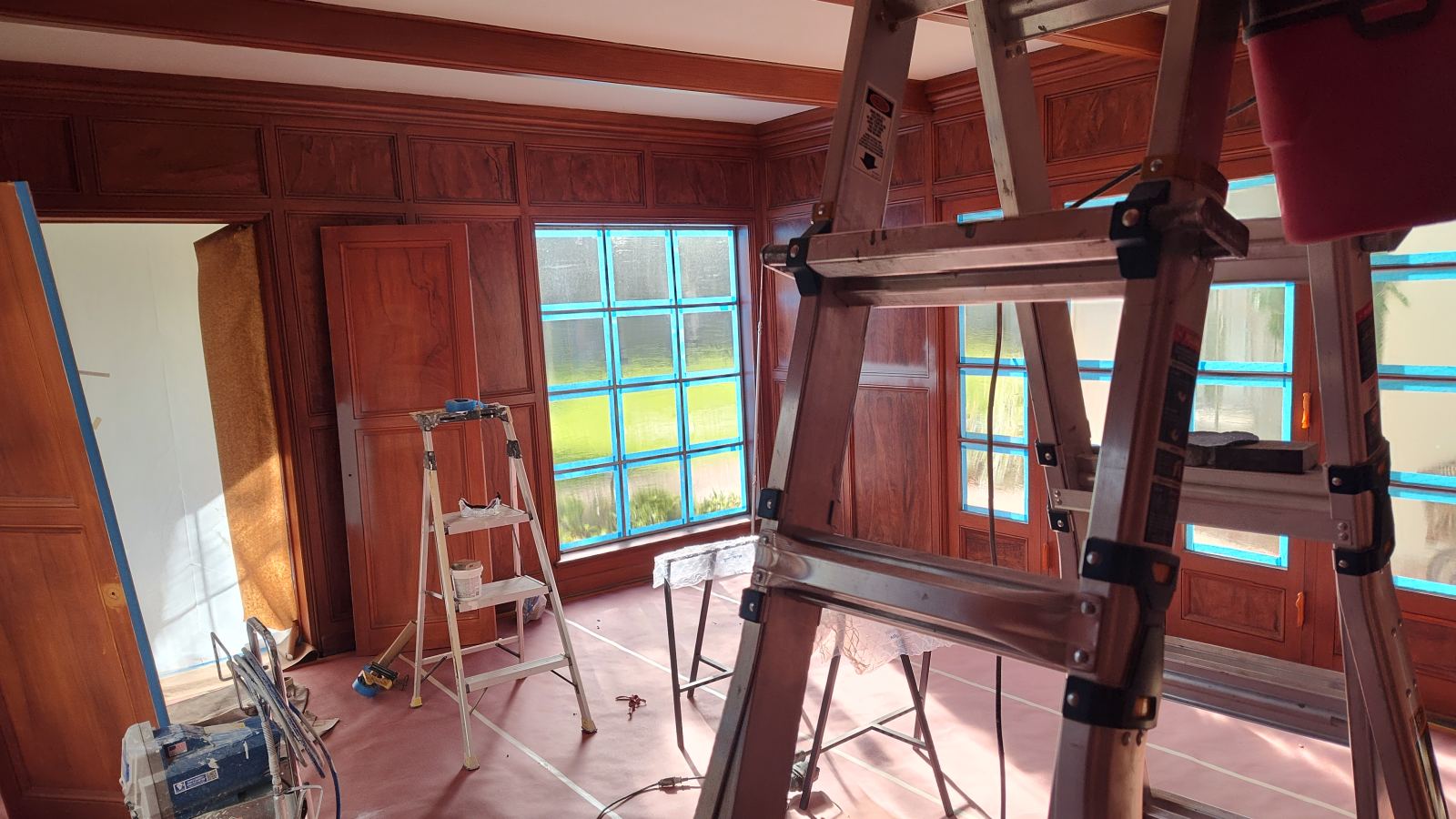 Wood-paneled study, mid-refinish